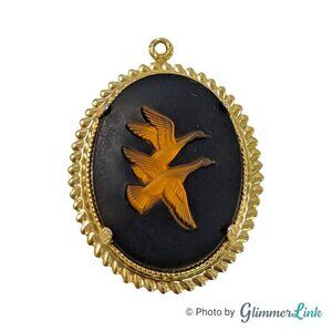 Vintage Flying Fowl Oval Black and Gold Tone Cameo Style Pendant